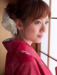 Yuna Asami wearing a beautiful traditional dress covering her big tits