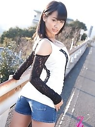 Busty asian Hana Haruna posing outside her natural big breasts!