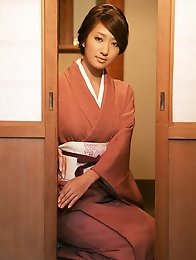 Sexy gravure idol beauty slowly takes off her pink kimono
