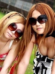 Cute Japanese babes pose outdoors