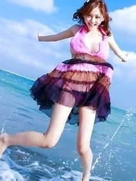 Anri Sugihara shows big melons while playing in water